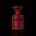 A matte dark red cylindrical bottle with a flared top, labeled 'DRUNK LOVERS' and 'EXTRACT EXTREME', centered on a black background with a faint reflection below.
