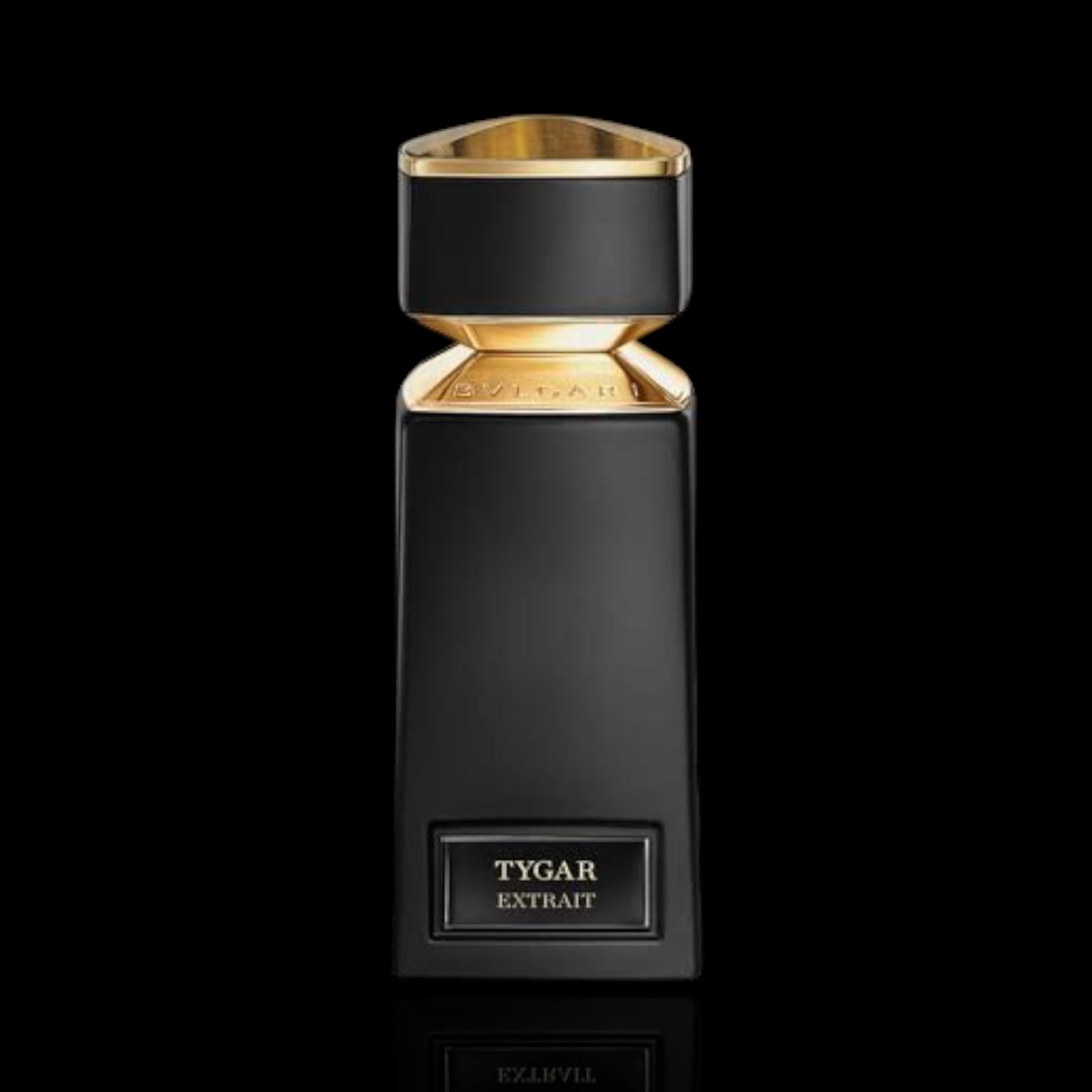 A luxury perfume bottle for Tygar Extract, featuring a matte black rectangular body with a metallic gold collar and a matching gold cap, set against a solid black background.
