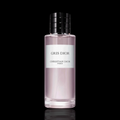 Christian Dior Gris Dior bottle with soft pink finish on a black background