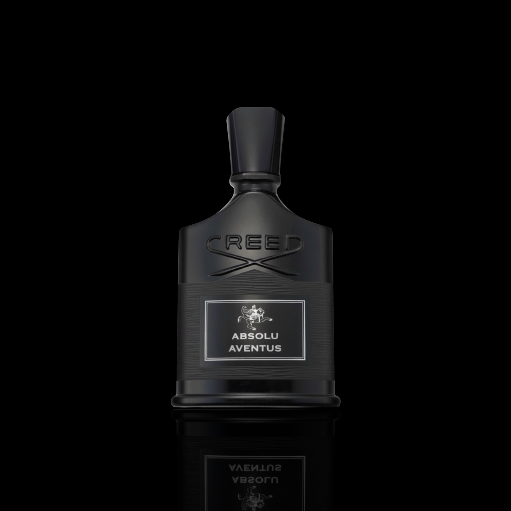 Creed Absolu Aventus bottle with black finish and black label on a black background