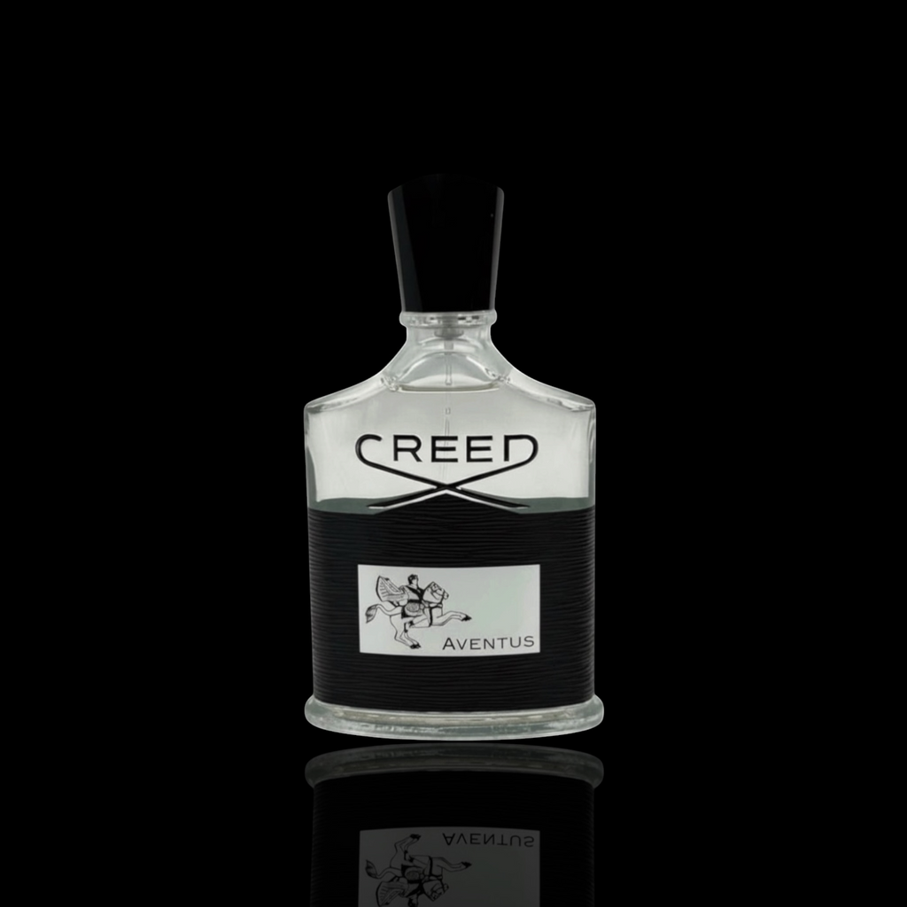 Creed Aventus bottle with clear glass and black label on a black background