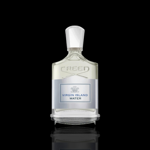 Creed Virgin Island Water bottle with clear glass and silver accents on a black reflective background.