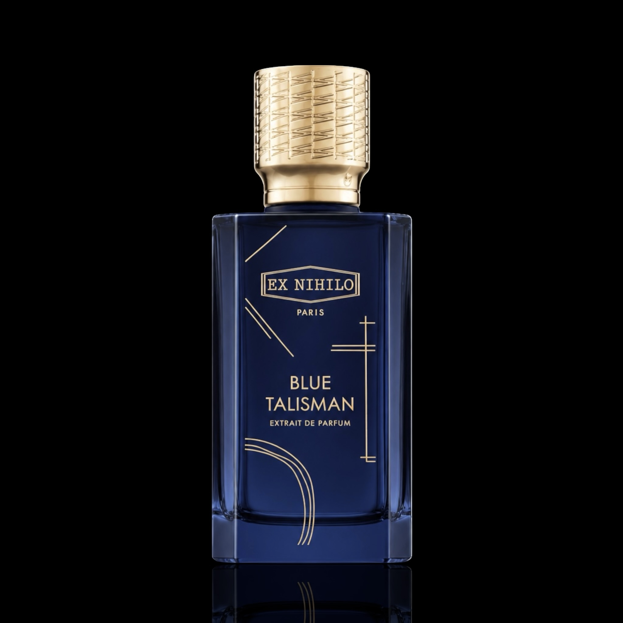 Ex Nihilo Blue Talisman Extrait de Parfum bottle with deep blue glass and gold accents on a black reflective background.