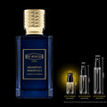 Ex Nihilo Brompton Immortals Extrait de Parfum blue bottle with gold cap beside glass decant sprays on a black background; 2 mL size highlighted. Original retail bottle not included.