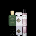 Parfums de Marly Haltane, Pernoire Anelo, and Christian Dior Gris Dior bottles displayed together on a black background with reflective surface