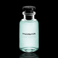 Louis Vuitton Imagination bottle with light aqua-tinted glass and black cap on a black reflective background.