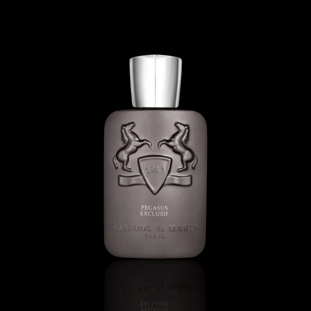 Parfums de Marly Pegasus Exclusif bottle with metallic taupe finish and silver cap on a black reflective background.
