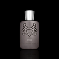 Parfums de Marly Pegasus Exclusif bottle with metallic taupe finish and silver cap on a black reflective background.
