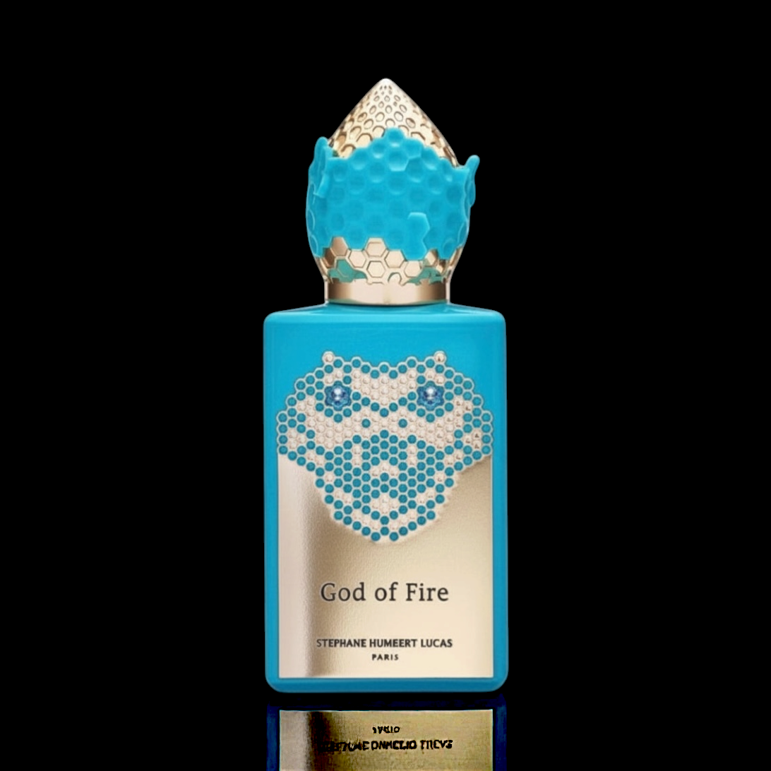 Stephane Humbert Lucas God of Fire bottle with turquoise blue design and decorative cap on a black background