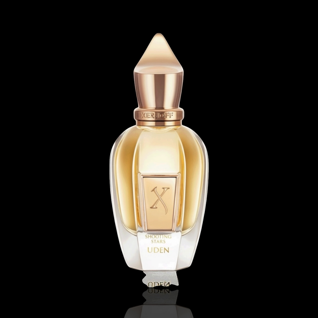 Xerjoff Uden bottle with gold-toned glass and rose gold accents on a black reflective background.