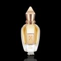 Xerjoff Uden bottle with gold-toned glass and rose gold accents on a black reflective background.