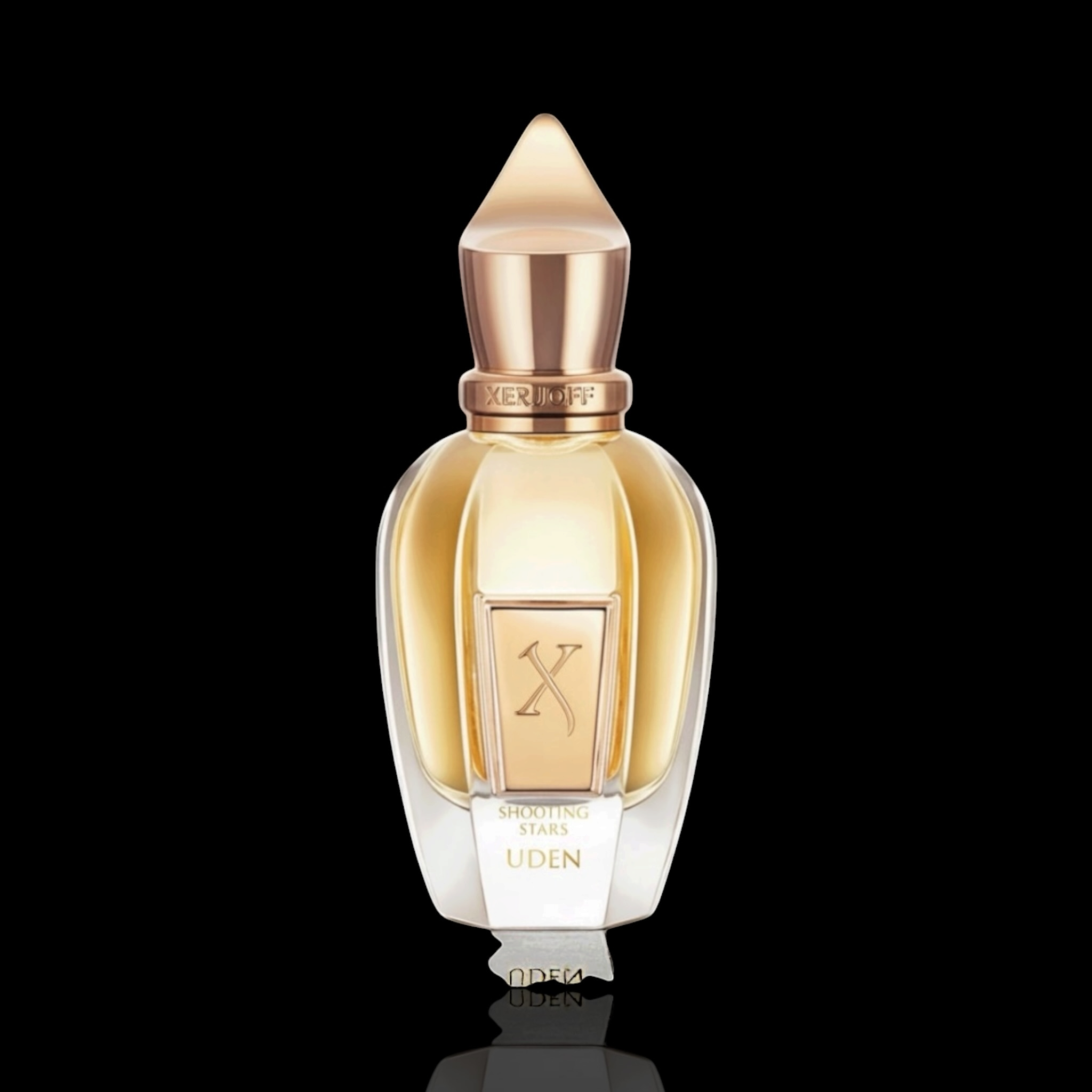 Xerjoff Uden bottle with gold-toned glass and rose gold accents on a black reflective background.