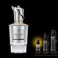 Mind Games Queening Extrait de Parfum bottle with 2 mL, 5 mL and 10 mL glass decant sprays; 2 mL size highlighted.