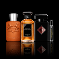 Vanilla Reserve Collection featuring Althaïr, Spiritueuse Double Vanille and Absolute Aphrodisiac source bottles beside a Rare Reserve Group decant atomizer. Full retail bottles not included.